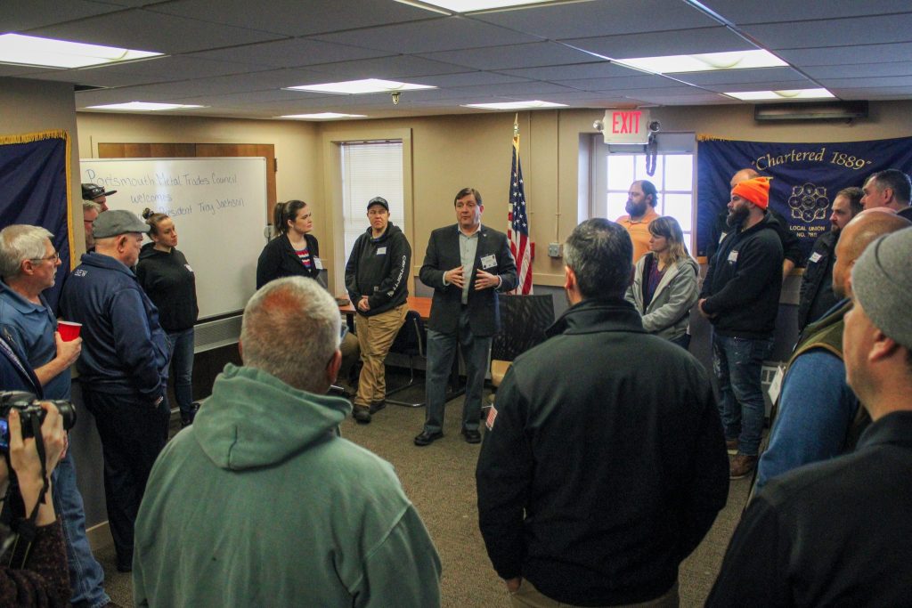 Troy speaks to workers gathered at Portsmouth Naval Shipyard