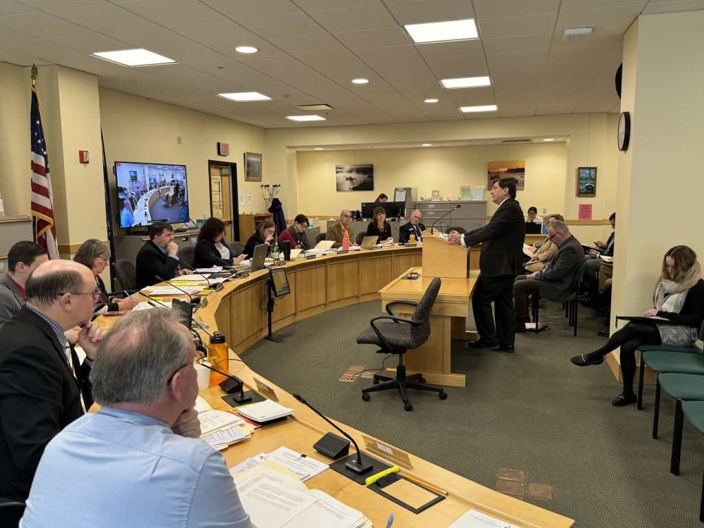 Troy testifies in front of a committee