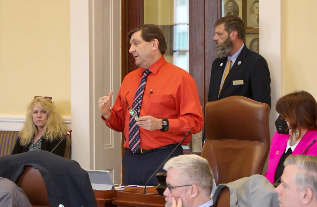 Troy speaks on the Senate floor wearing an American flag tie